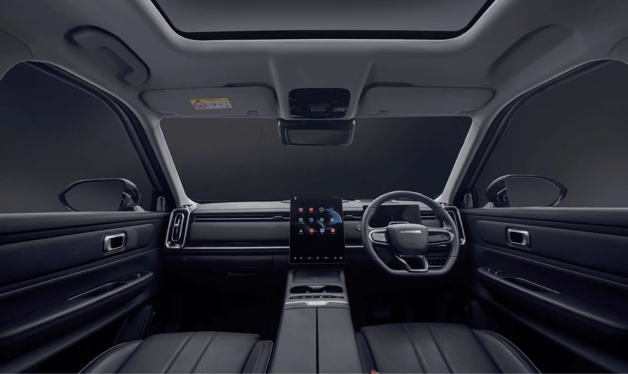Interior JAECOO J7 serba hitam dengan layar vertikal dan jok kulit